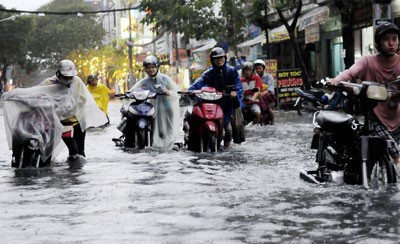 Flooding is a permanent problem in HCMC (Photo: SGGP)
