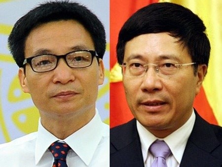 The National Assembly approved this morning the appointment of current Government Office head Vu Duc Dam (L) and Minister of Foreign Affairs Pham Binh Minh (R) as new deputy prime ministers.— File Photo