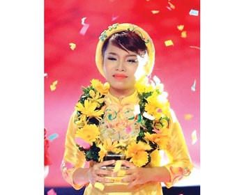 Vu Thao My wins ‘The Voice of Vietnam’ singing competition 2013.