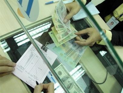The State Bank will continue to keep the interest rate ceiling on dong deposits to stabilize interest rate levels in the market (Photo: XL)