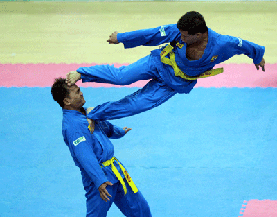 Vietnamese traditional Vivonam martial artists on the competition day at the 27th SEA Games(Photo: SGGP)