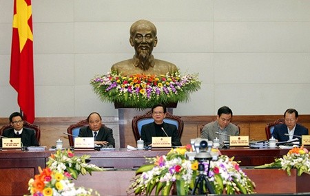 Prime Minister Nguyen Tan Dung chairs a teleconference between the Government and provincial and city administrations.—VNA/VNS Photo
