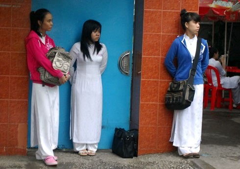 Senior school students have to wear coats as the weather is cold