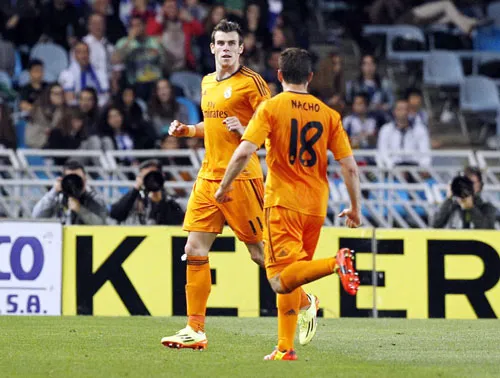 Gareth Bale (trái) đã tạo nên sự khác biệt cho Real Madrid.