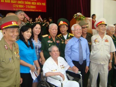 Chairman of the municipal People’s Committee Le Hoang Quan attends the meeting celebrating the 60th anniversary of the Dien Bien Phu Victory in Ho Chi Minh City. (Photo: Sggp)