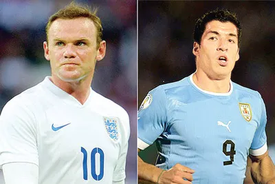 Rooney (Anh, trái) và Suarez (Uruguay).