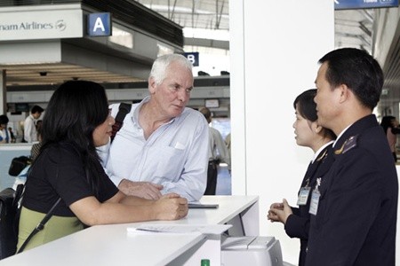 Foreign visitors claim a VAT refund at Tan Son Nhat International Airport in HCM City. Customs departments in Ha Noi and HCM City have been told to strengthen the supervision of goods that are eligible for value added tax refunds at the cities' international airports to avoid losses to the State budget. — VNA/VNS Photo Hoang Hai