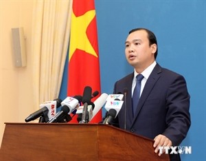 Foreign Ministry Spokesman Le Hai Binh speaks at the press briefing on July 24 (Photo: VNA)