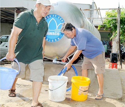 People in a rural district use fresh water (Photo: SGGP)