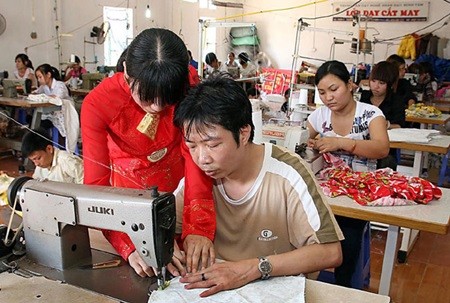 A vocational class for disabled people in Ha Noi's Thach That District. Experts said that more support should be provided for women with disabilities to overcome gender barriers. — VNA/VNS Photo Quy Trung