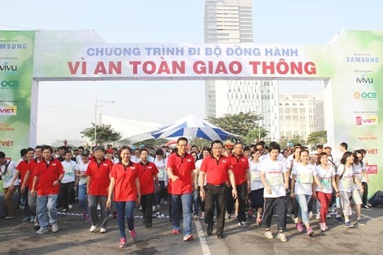 Ho Chi Minh City people join in the walk for traffic safety at Phu My Hung District 7 on January 31 Photo: SGGP