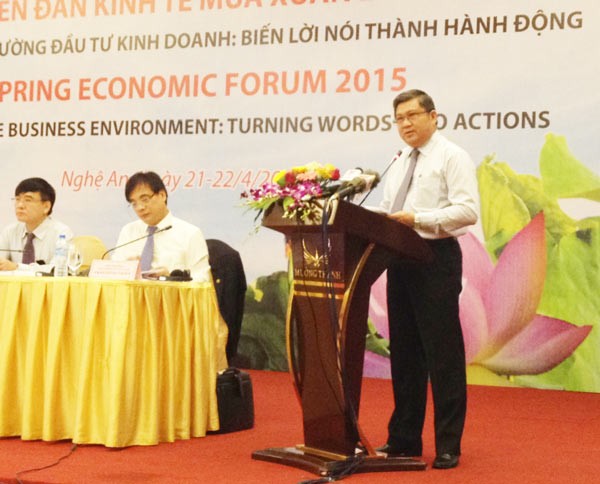 Chairman of the NA Committee for Economics, Nguyen Van Giau speaks at the opening ceremony of the forum.(Photo:SGGP)