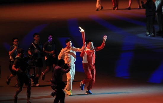 The torchlight procession of host country. (Photo:SGGP)