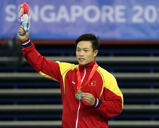 Dang Nam wins a gold medal in the men's rings. (Photo:SGGP)