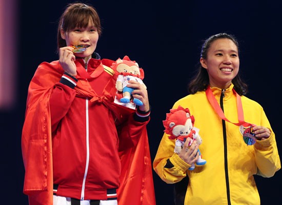 Ha Thi Nguyen wins gold medal in the women’s under 62 kg finals.(Photo:SGGP)