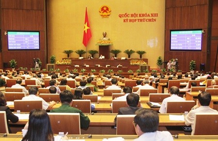 Most deputies voted to pass the revised Law on State Audit at the ongoing ninth session of the 13th legislature in Ha Noi yesterday. — VNA/VNS Photo Phuong Hoa