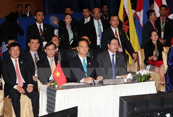 Prime Minister Nguyen Tan Dung (front, center) attends the plenary session (Photo: VNA)