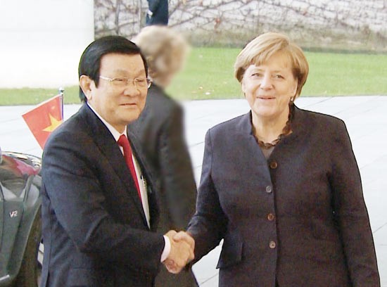 President Truong Tan Sang met German Chancellor Angela Merkel in Berlin. (Photo: SGGP)