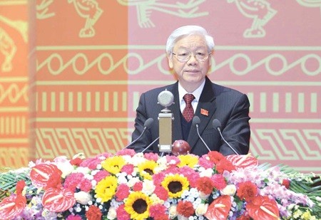 Party General Secretary Nguyen Phu Trong gives a report on the 11th Party Central Committee at the opening session of the 12th National Party Congress in Ha Noi yesterday.
