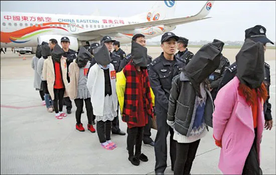 Trung Quốc và Lào phá băng nhóm lừa đảo viễn thông xuyên biên giới