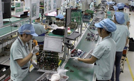 Electronics being manufactured for export at Electronics Viet Nam Co in northern Ha Nam Province. (Photo: VNA/VNS)