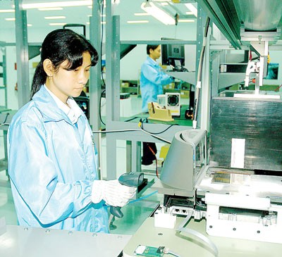 Workers at a FDI firm in Vietnam (Photo: SGGP)