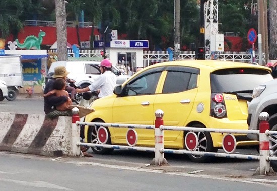 Beggars in HCMC (PHoto: SGGP)