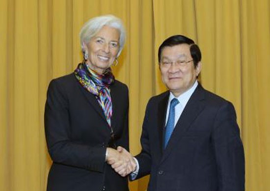 Vietnamese President Truong Tan Sang (R) and Managing Director of the International Monetary Fund (IMF) Christine Lagarde. (Source: VNA)