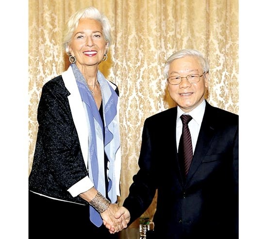 General Secretary of Vietnam National Assembly Nguyen Phu Trong (R) and IMF chief Christine Lagarde. (Photo:SGGP)