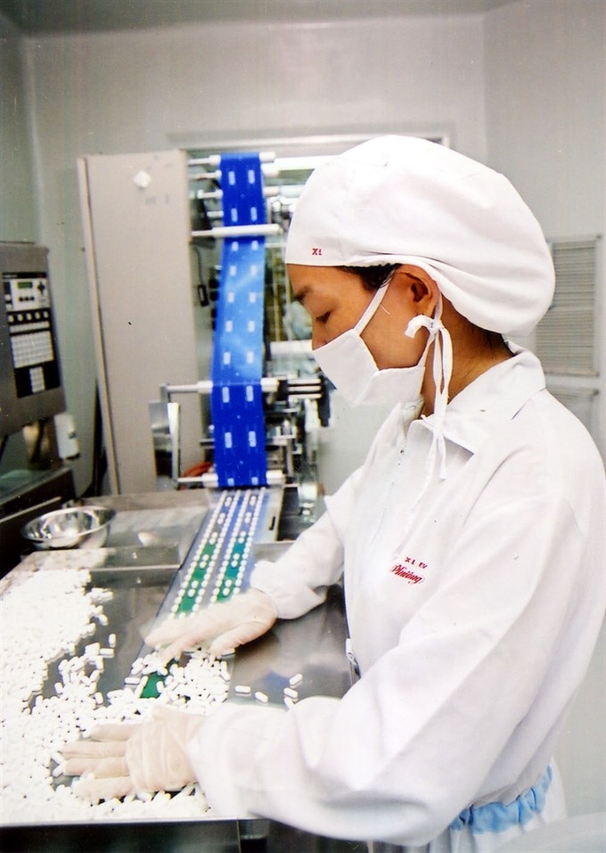 The capsule production line of Hậu Giang Pharmaceutical Company in southern Cần Thơ Province. Firms were urged to adopt appropriate business strategies to exploit opportunities from free trade agreements. - VNA/VNS Photo Huy Hùng