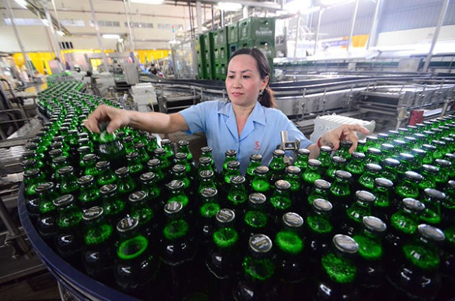 The file photo shows a production line at a plant of Saigon Beer who belongs to Sabeco