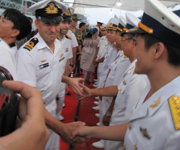 Vietnam navy delegation welcomes Australian crew members and naval officers.