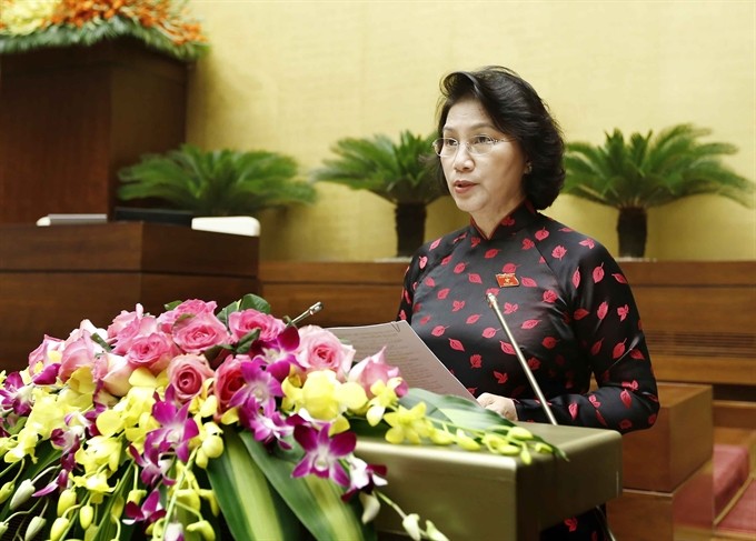 NA Chairwoman Nguyễn Thị Kim Ngân, on behalf of the 13th NA Standing Committee, submits to the 14th NA to consider the 14th NA Standing Committee personnel that includes one Chairperson, four Vice Chairpersons and 13 members. VNA