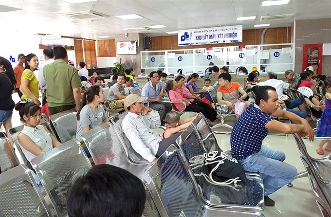 Patients waiting for their turn at a Hanoi hospital. — VNS photo Thai Ha