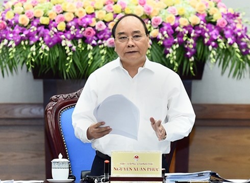Prime Minister Nguyễn Xuân Phúc delivers speech at a Cabinet regular monthly meeting yesterday. (Photo: VGP)