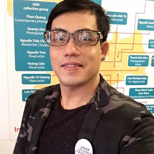 Visibility through action: HCM City-based visual artist, poet, songwriter and independent curator Nguyễn Như Huy, a member of project In/VISIBLE at ZeroStation. — Photo Facebook.com/nguyennhuhuy