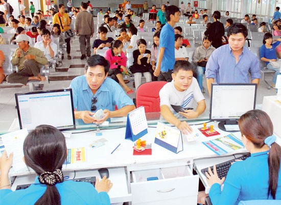 Passengers buy train tickets for Tet holiday.