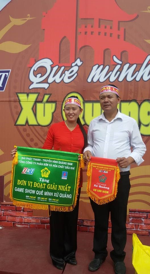 Having fun: Thu Ha, a caterer, and her husband participate in a TV game show.