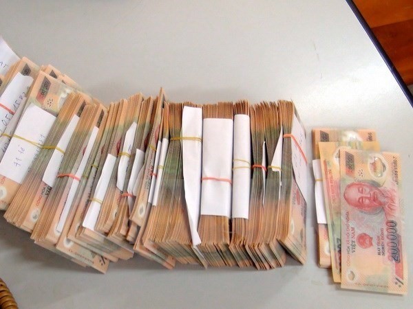 The Ministry of Public Security has arrested a suspect for spreading bank note change rumors on social networks. (Photo: VNS)