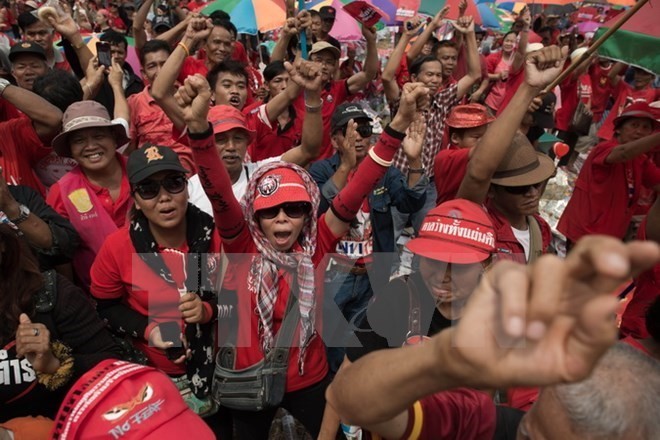 A protest by red-shirts in Bangkok, 2014. (Source: AFP/VNA)