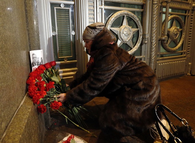 A woman pay their respects laying flowers near a picture of Russia’s ambassador to Turkey Andrei Karlov outside the Russian foreign ministry in Moscow, Russia on Monday. Russia’s ambassador to Turkey, Andrey Karlov, has been shot at an art exhibition in the Turkish capital of Ankara. Karlov has died of his wounds after the attack, Russia’s Ministry of Foreign Affairs confirmed. — EPA PhotoRead more at http://vietnamnews.vn/world/348293/lavrov-says-ambassadors-murder-aimed-at-disrupting-normalisation-of-russian-turkish-ties.html#gmtp4Q7fjSAYfdqG.99