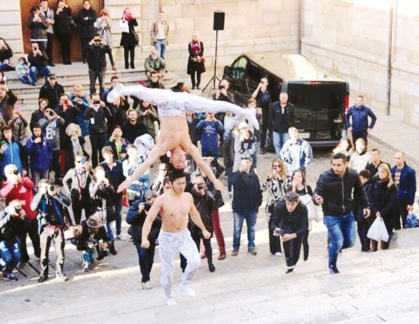 Giang Quoc Co and Giang Quoc Nghiep perform the stunt at the Cathedral of Girona in Spain