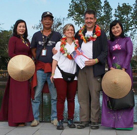 The two lucky visitors (the second & third person from right) were the 2.5 millionth arrivals visit Complex of Hue Monuments