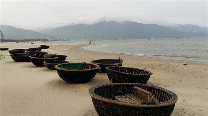 Beached: Coracles line a beach on the Son Tra Peninsula in Da Nang City. (Photo: VNS)