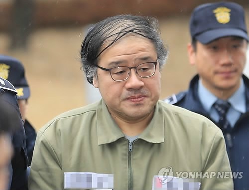 An Chong-bum, former senior presidential secretary for policy coordination, appears at the Constitutional Court in Seoul on Feb. 22, 2017, to testify during the 16th hearing of President Park Geun-hye's impeachment trial. (Yonhap)