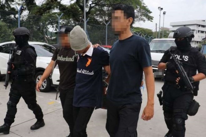 One of the suspects arrested by Malaysian police. (Source: straitstimes.com)