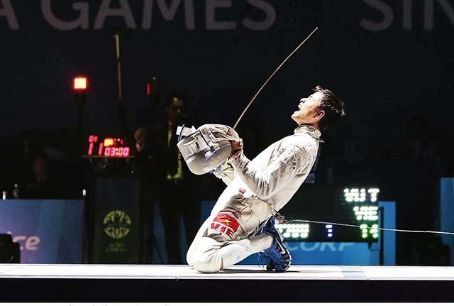 Fencer Vu Thanh An is one of five Vietnamese athletes at the South Korean Fencing Grand Prix. — Photo nhandan.com.vn