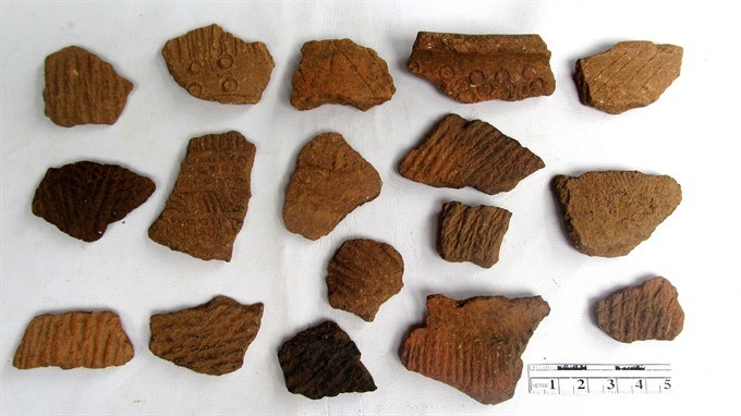 Ceramic pieces found at Na Tham Cave. Photo courtesy of Trinh Nang Chung