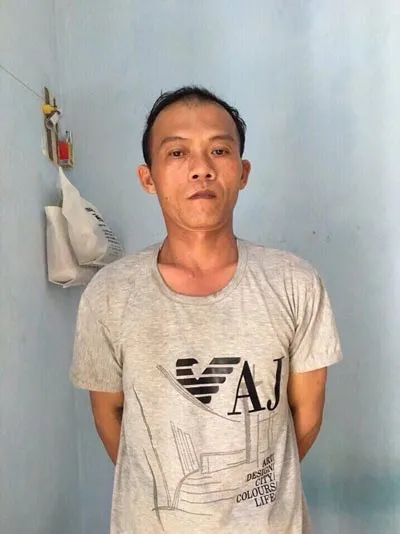 Tạm giữ gã chồng treo ngược, tưới xăng dọa đốt vợ cũ ảnh 1