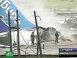 Máy bay nổ tung, gần 200 người chết và bị thương